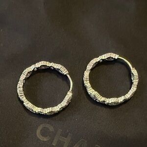 Silver tone diamond cut detail hoop earrings